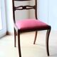 Antique wooden chair – Openwork backrest and pink-red seat