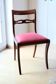 Antique wooden chair – Openwork backrest and pink-red seat