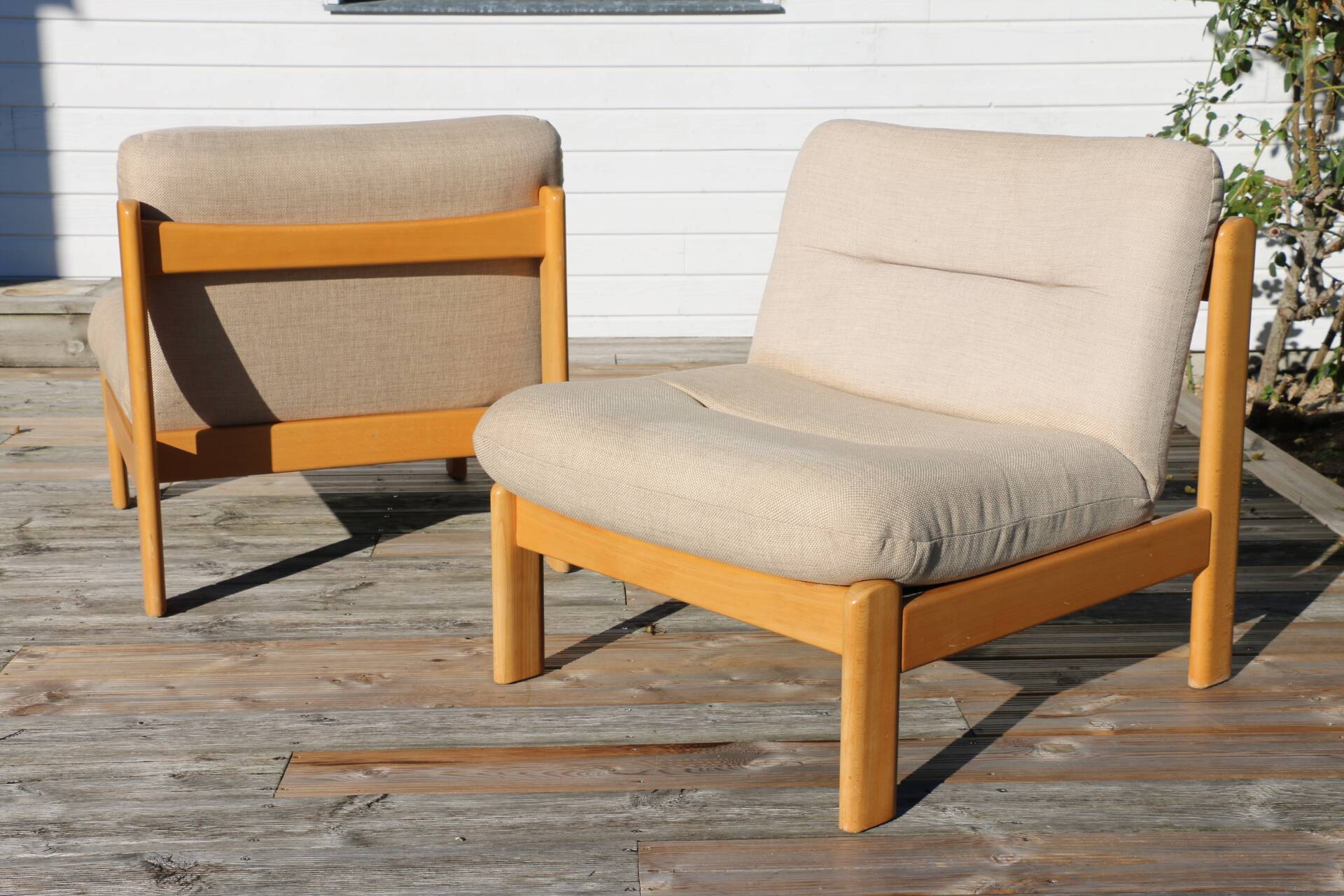 Pair of wood and fabric lounge chairs, 1980