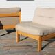 Pair of wood and fabric lounge chairs, 1980