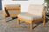 Pair of wood and fabric lounge chairs, 1980