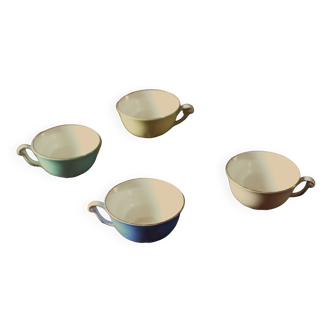 A set of 4 coffee cups in Céranord gilding colors