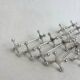 series of brutalist and sculptural silver-plated knife rests