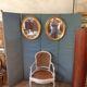 Pair of golden oval mirrors
