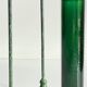 Green glass and metal candle holders