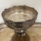 set of 3 silver metal chisel bowls with their tray