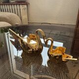 Pair of golden salt cellars in Limoges porcelain shaped like swans