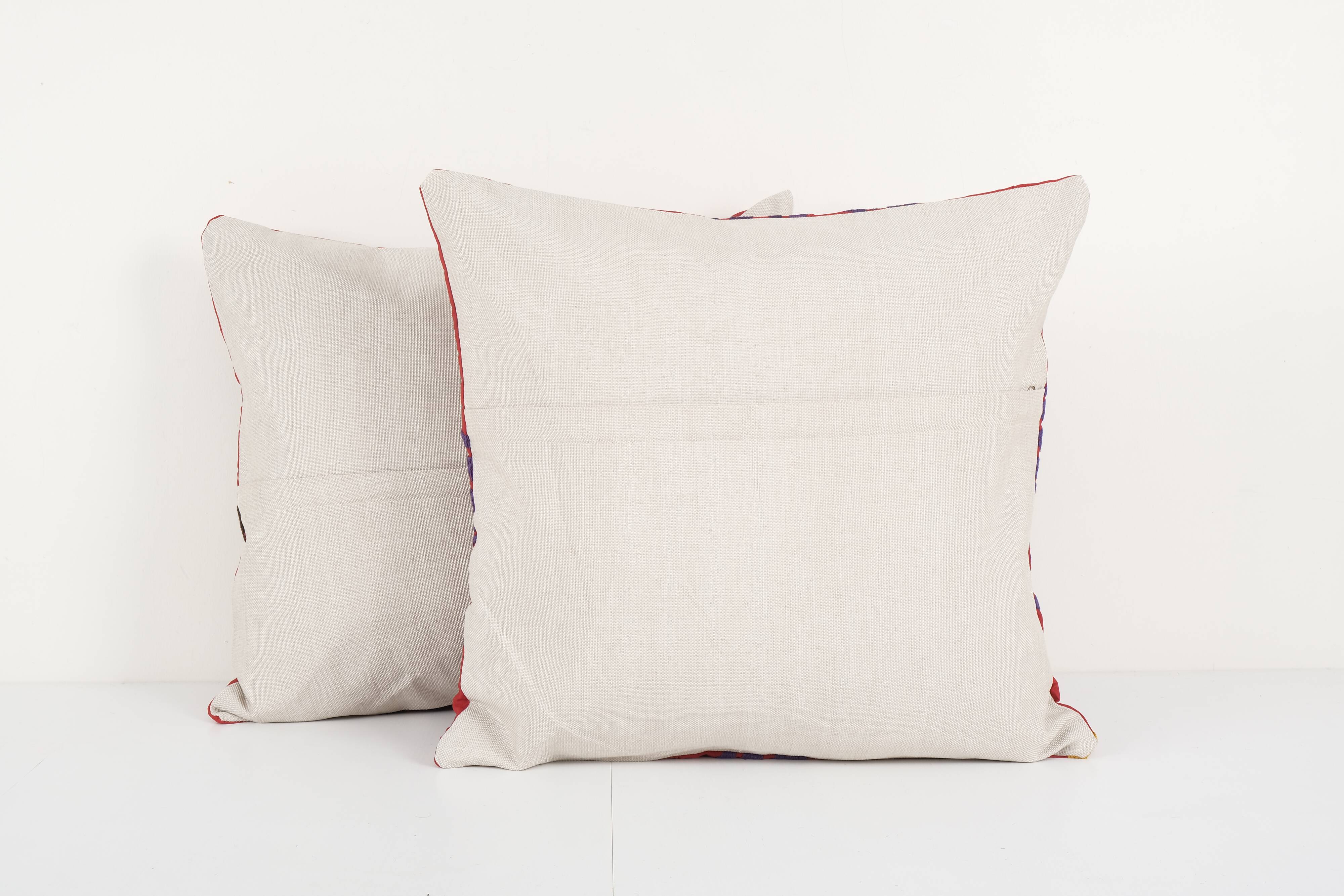 Red tashkent suzani square matching pillow cases