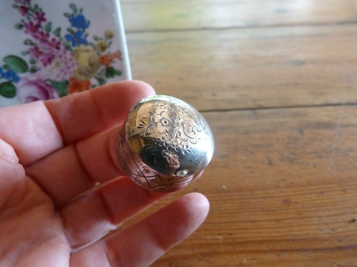 Floral porcelain bathroom bottle with engraved silver cap