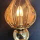 Pair of vintage brass wall sconces with glass shades