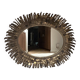 Large oval sun mirror in patinated gold metal.