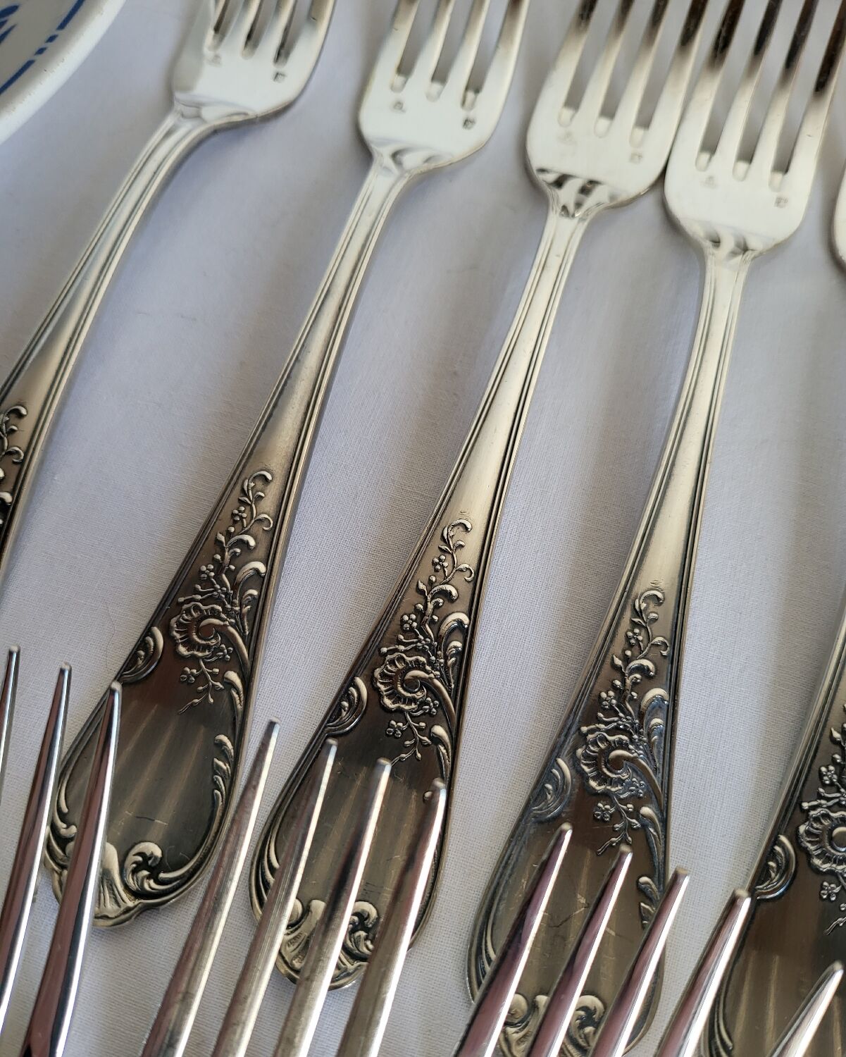 12 large silver-plated metal table forks by Guildart