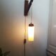 Wooden applique with 60s glass blind