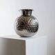 Vintage Italian vase in nickel-plated brass from the 1960s, hand-hammered relief of fruits and leaves.