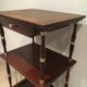 Small table in mahogany, leather and brass