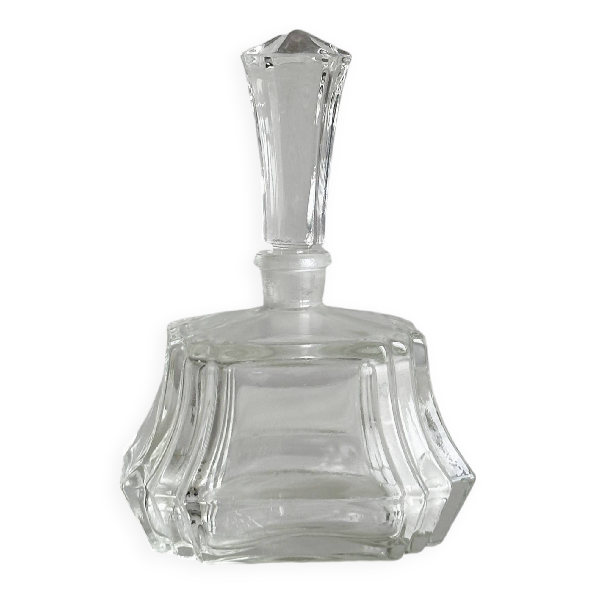 Small transparent faceted glass bottle