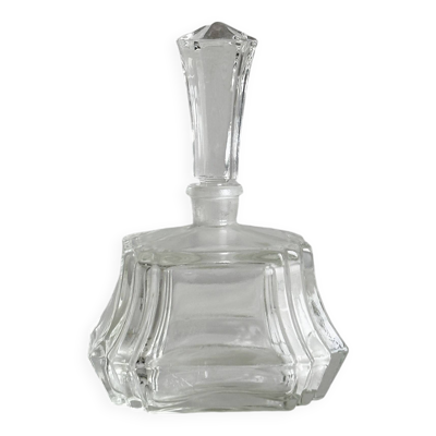Petit flacon en verre facetté transparent