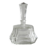 Small transparent faceted glass bottle