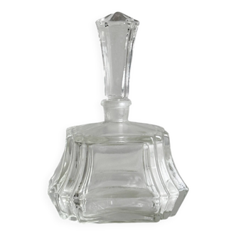 Petit flacon en verre facetté transparent