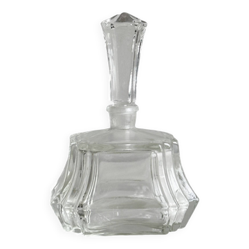 Petit flacon en verre facetté transparent