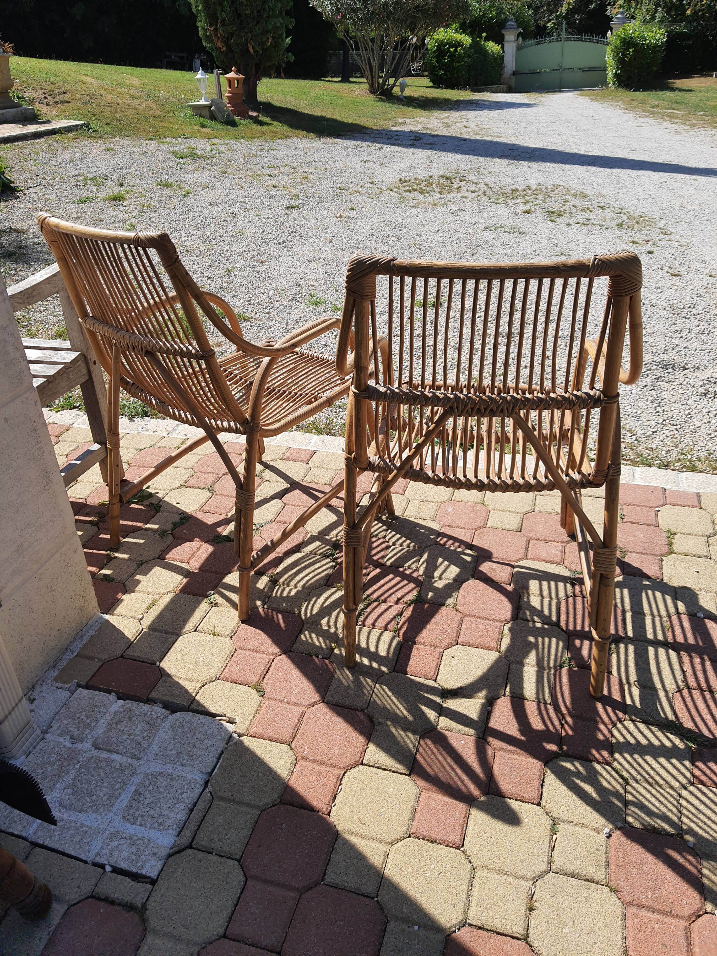 Pair of vintage rattan armchairs