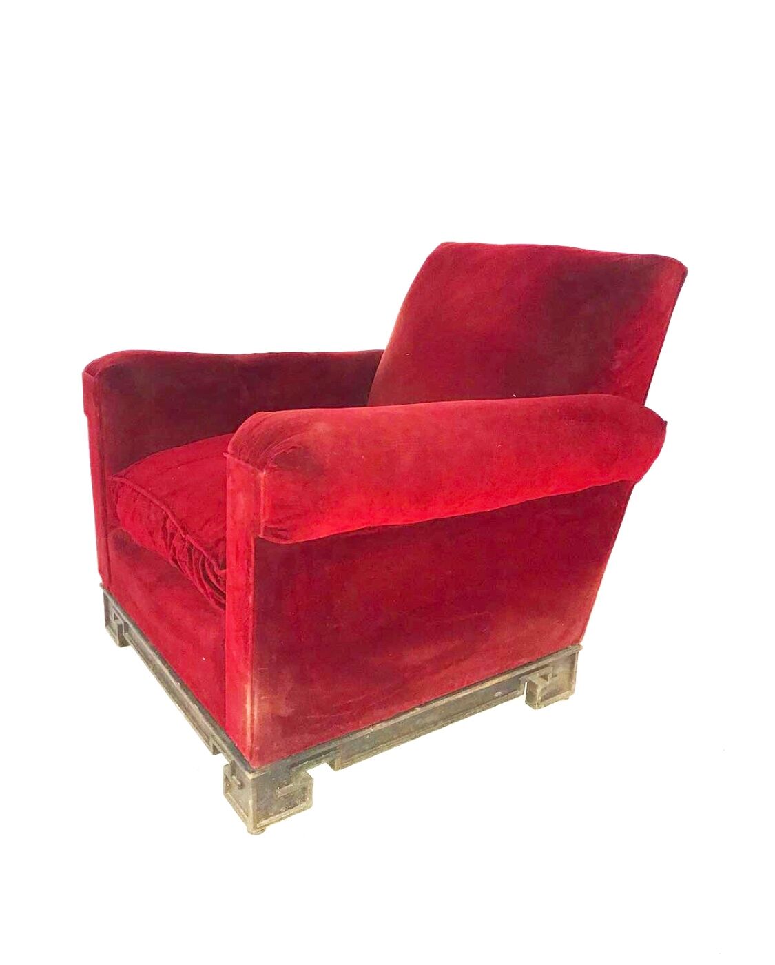 Red armchair with decorated base