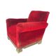 Red armchair with decorated base