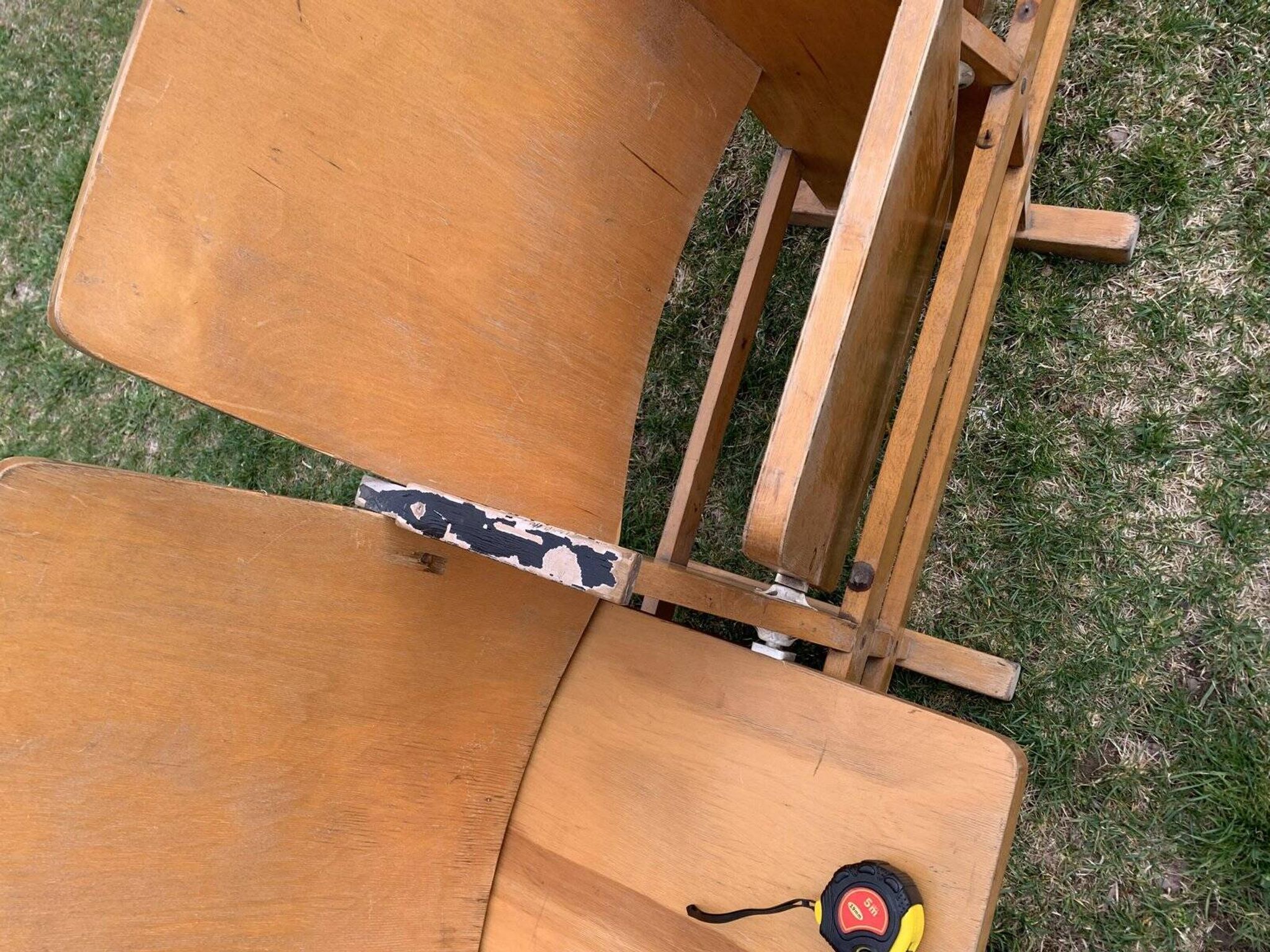 Vintage cinema bench for four people, brown varnished beech in Mid-Century style from the 1950s.