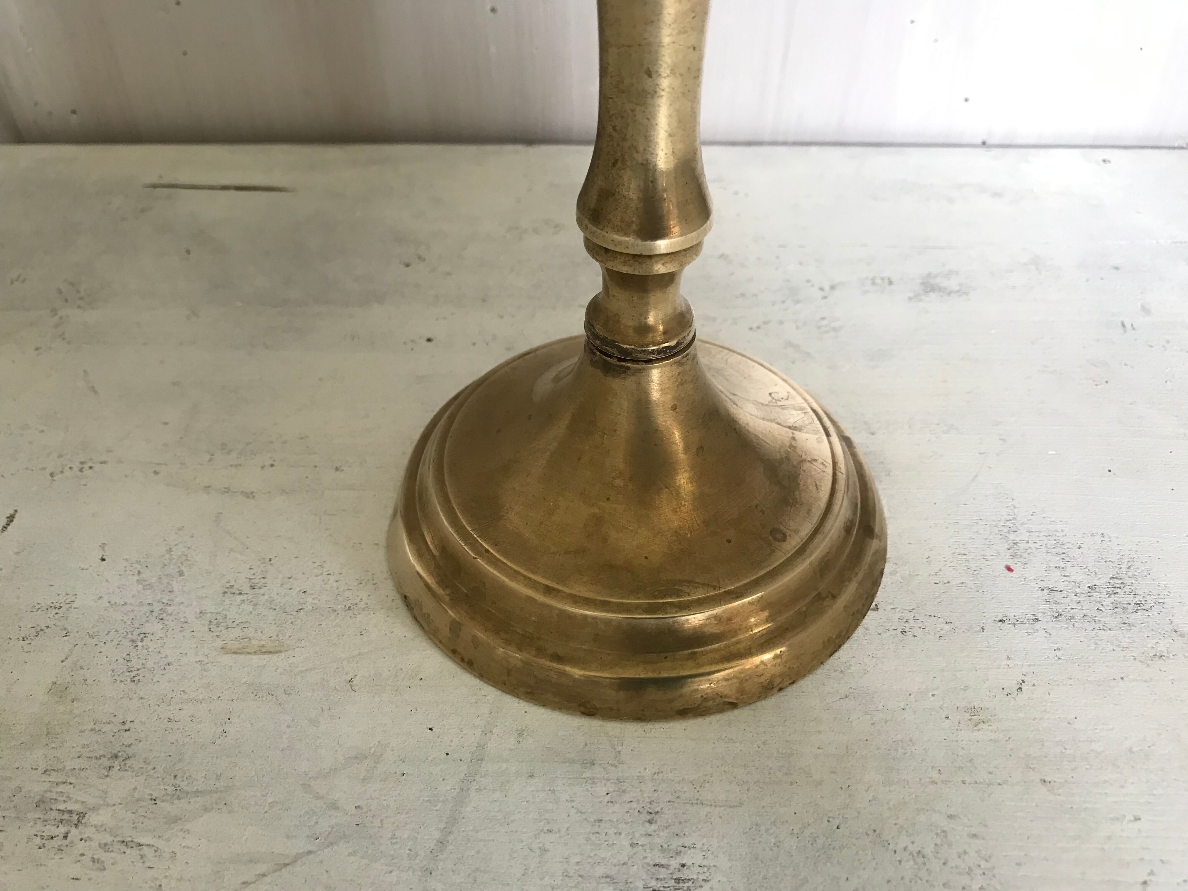 Ancient gilded bronze candlestick