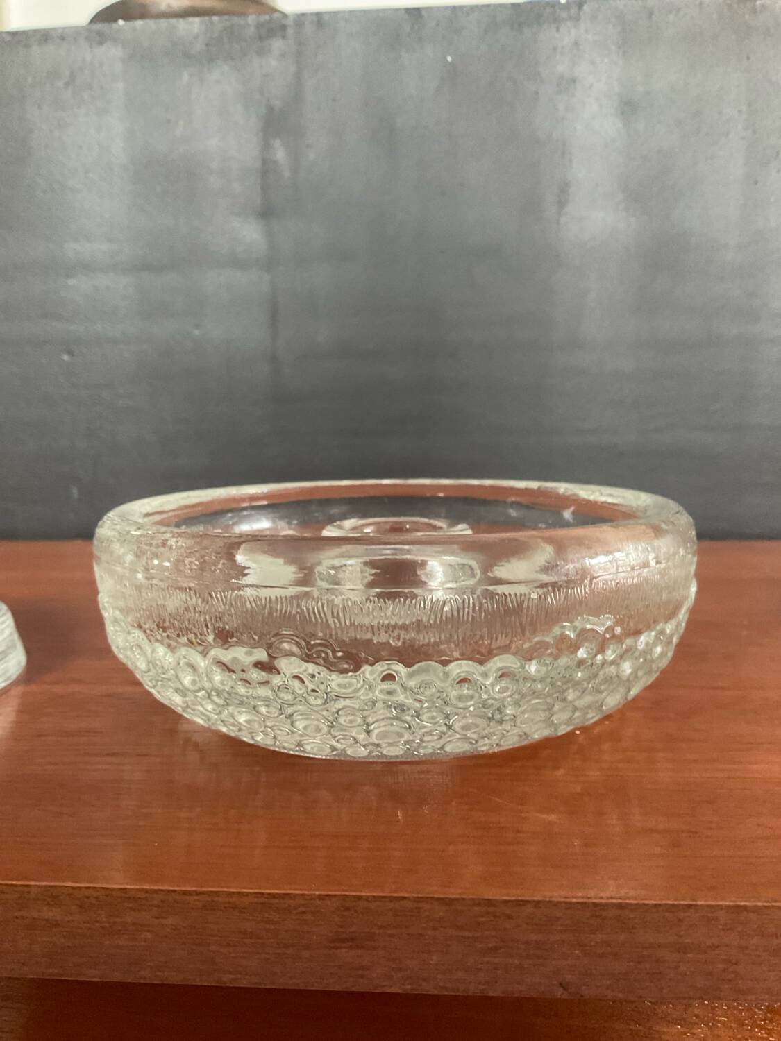 Set of three round thick moulded glass candle holders