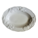 Oval white vegetable dish, an antique tableware piece in barbotine earthenware.