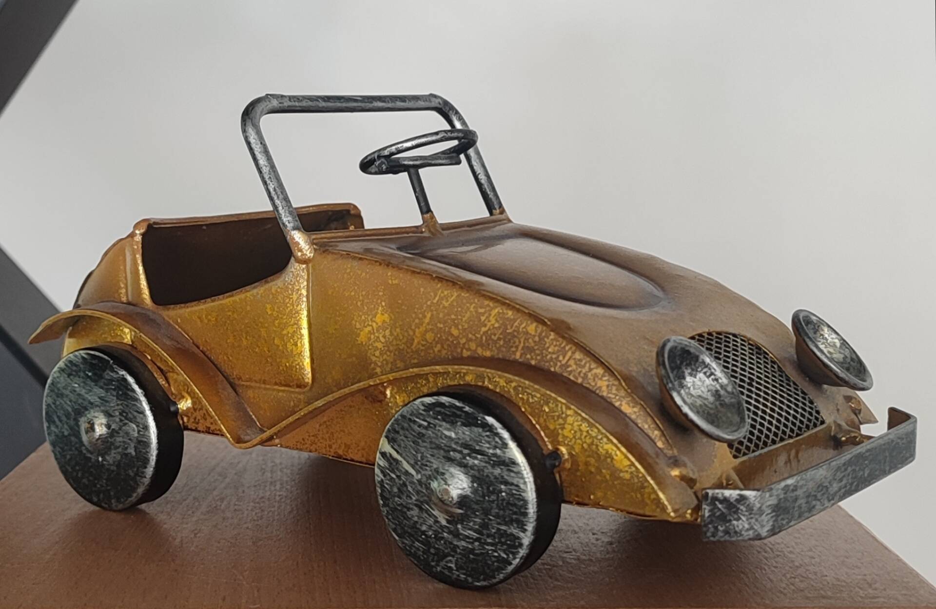 Vintage metal car in industrial style