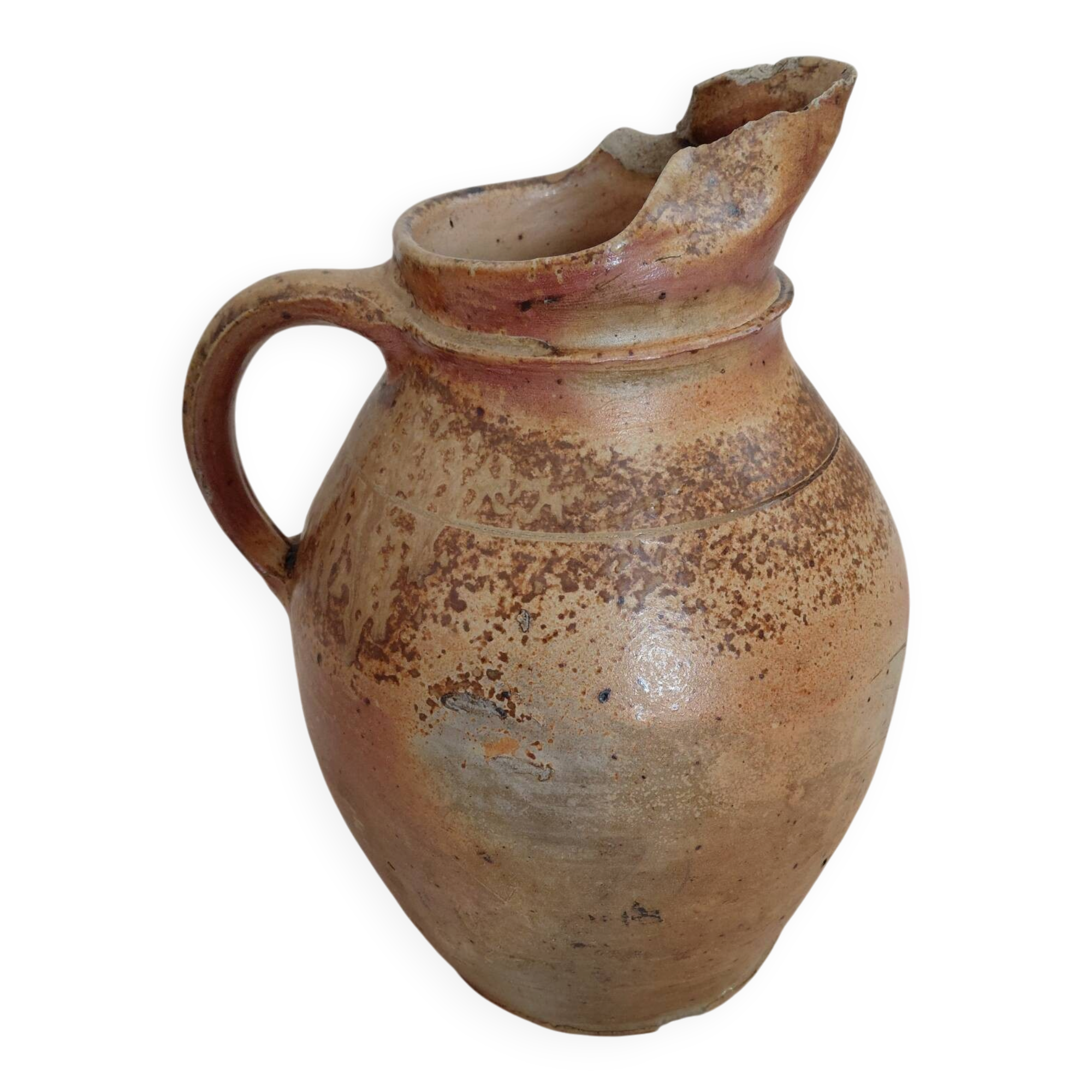 Old farm jug in glazed stoneware