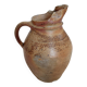 Old farm jug in glazed stoneware