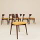 Ensemble de 6 chaises de salle à manger scandinaves en moutarde bouclée.