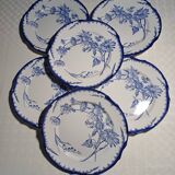 6 flat plates with floral decoration, T. de fer.