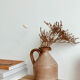 Old sandstone vase