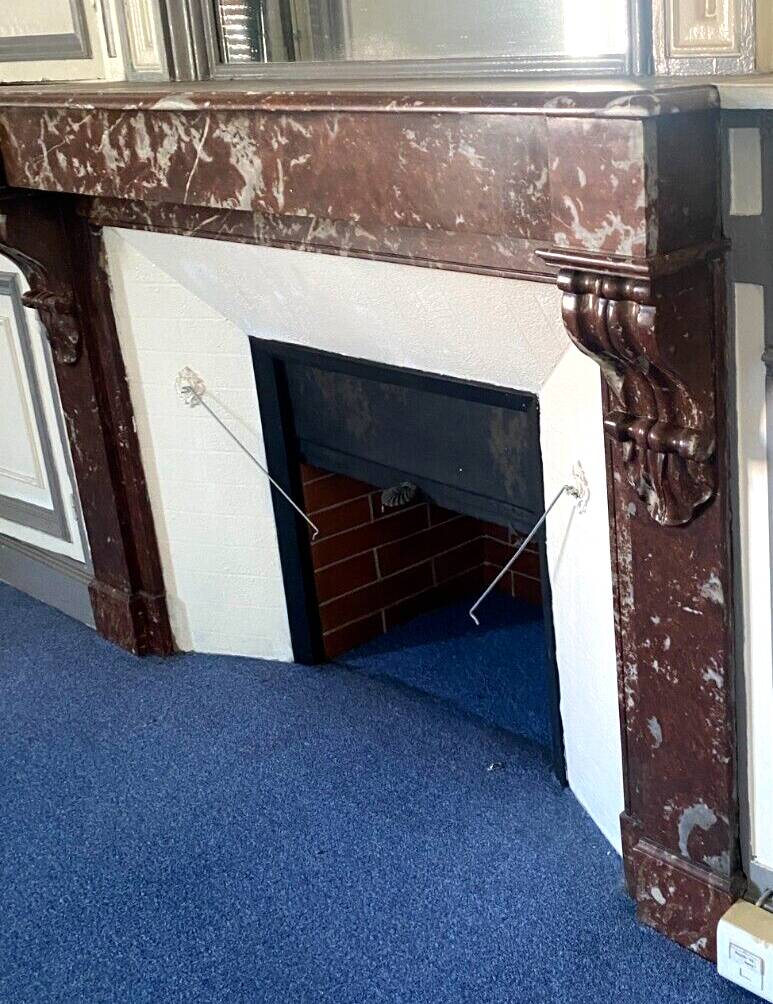 Louis Philippe style fireplace in speckled red marble 20th century