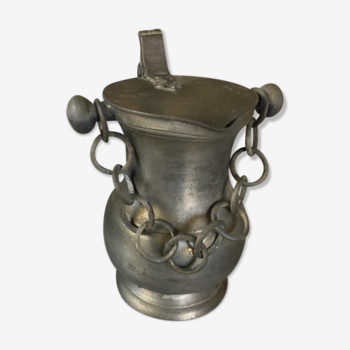 Tin pitcher with carrying chain