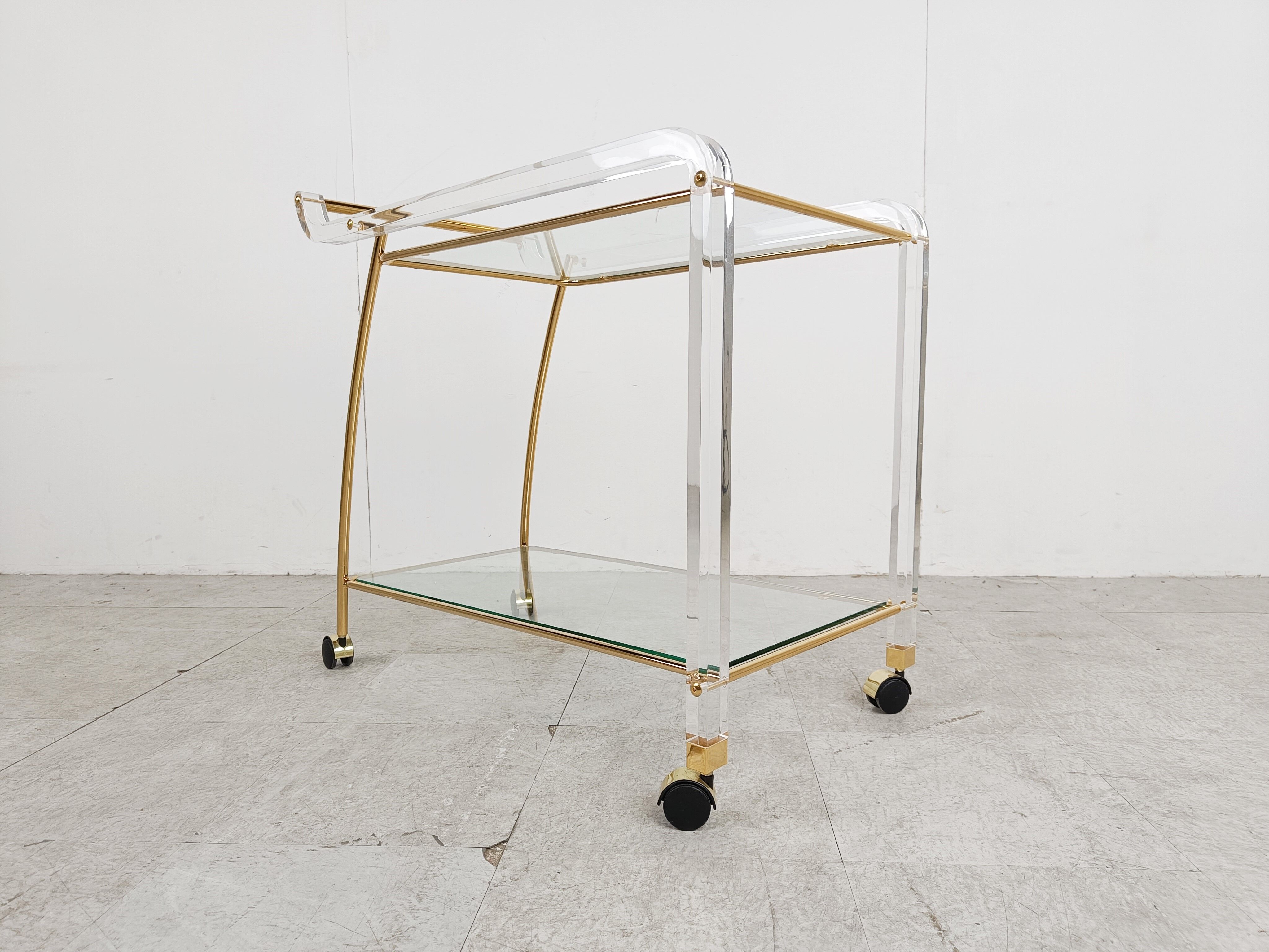 Brass and lucite drinks trolley, 1970s