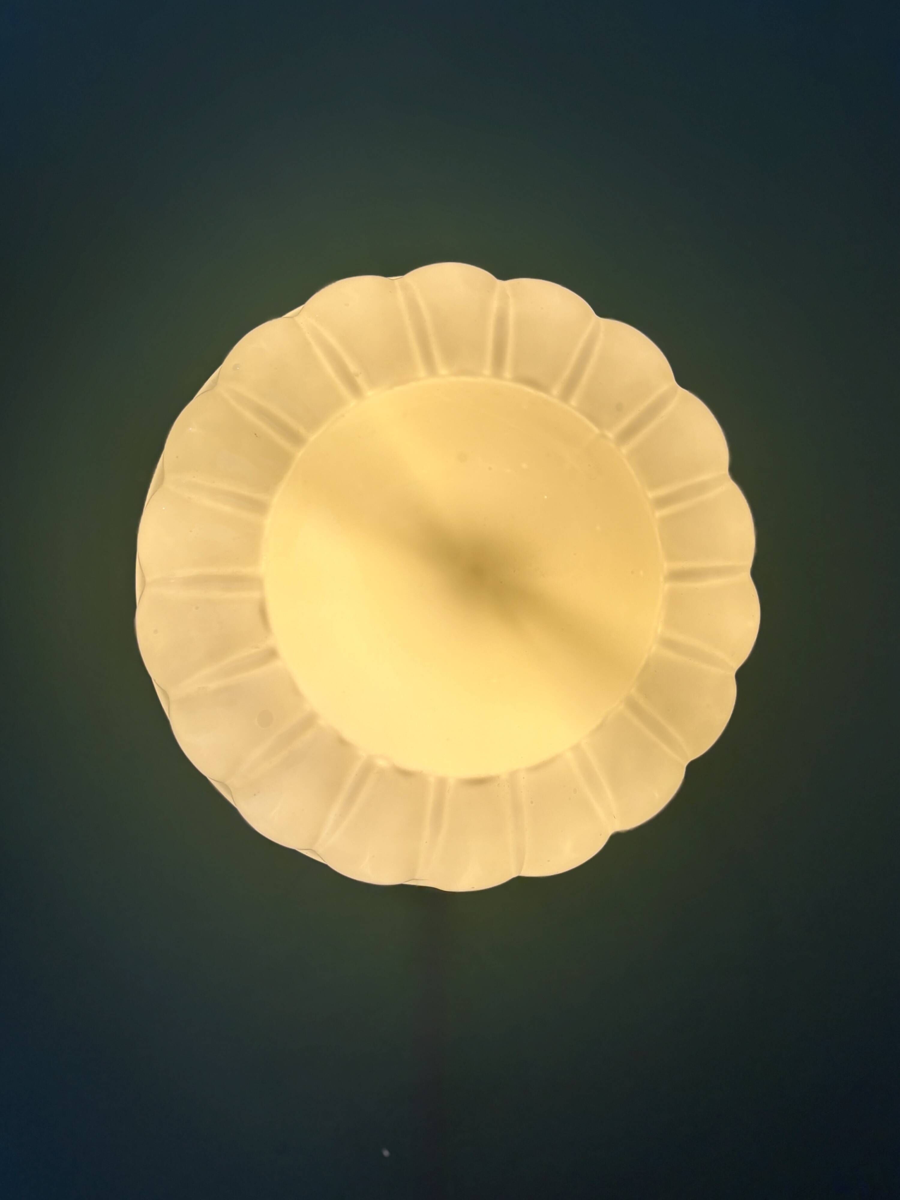 Vintage Art Deco globe wall or ceiling light in yellow opaline.