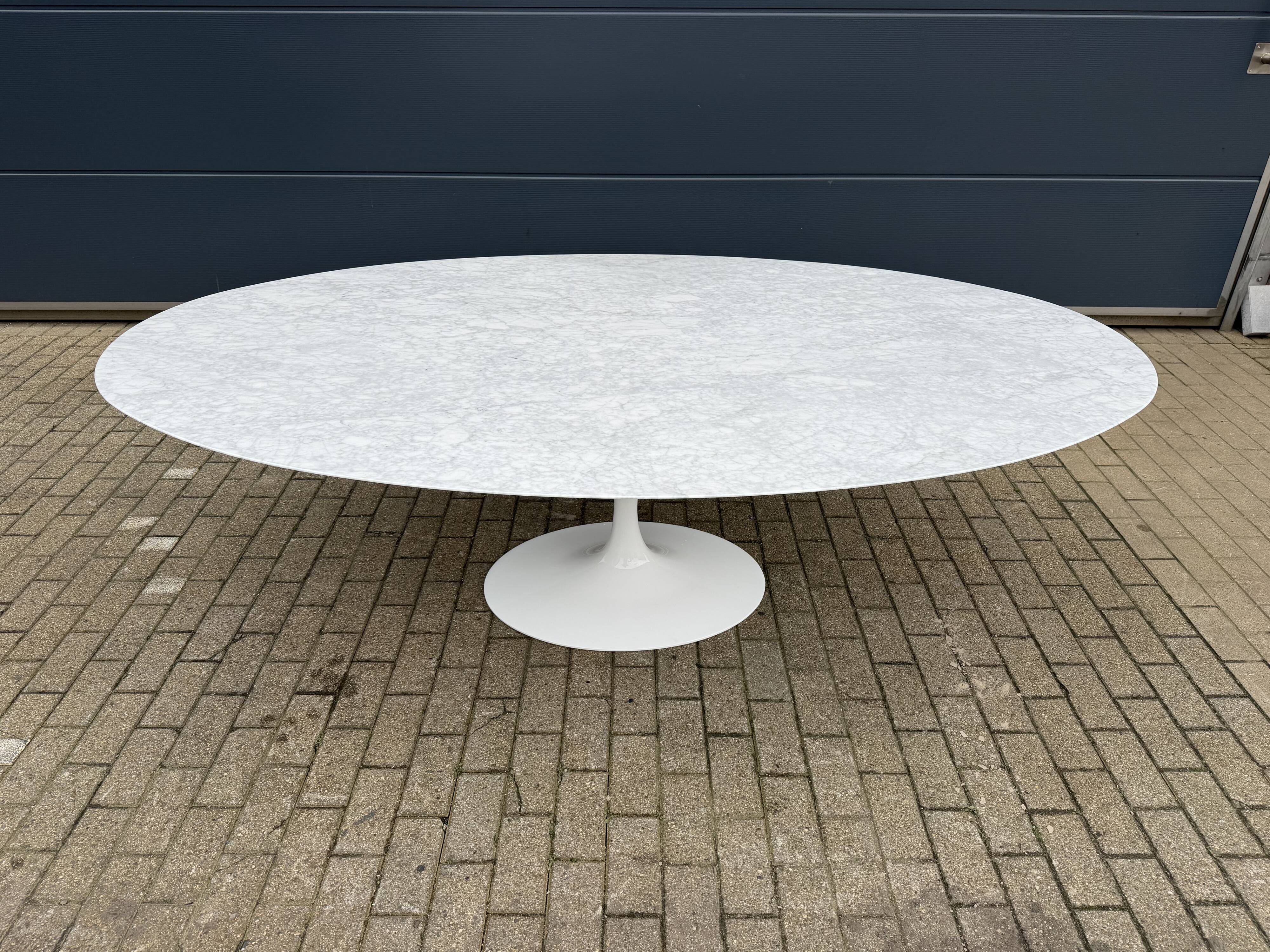 Original Knoll Tulip oval dining table (244cm) in Carrara marble.