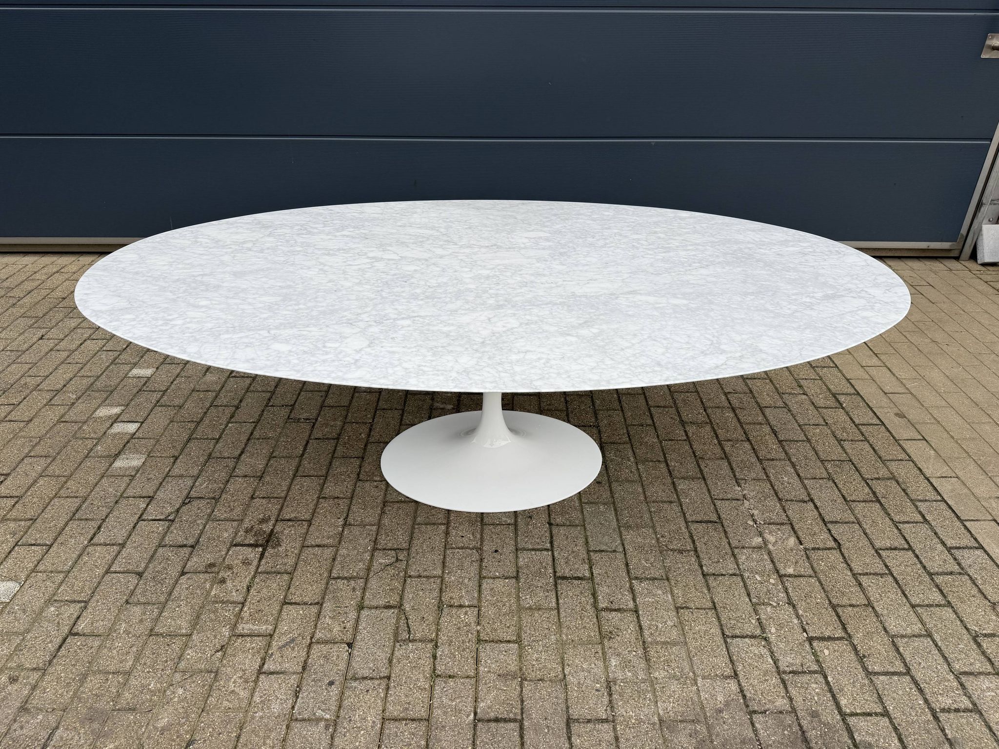 Original Knoll Tulip oval dining table (244cm) in Carrara marble.