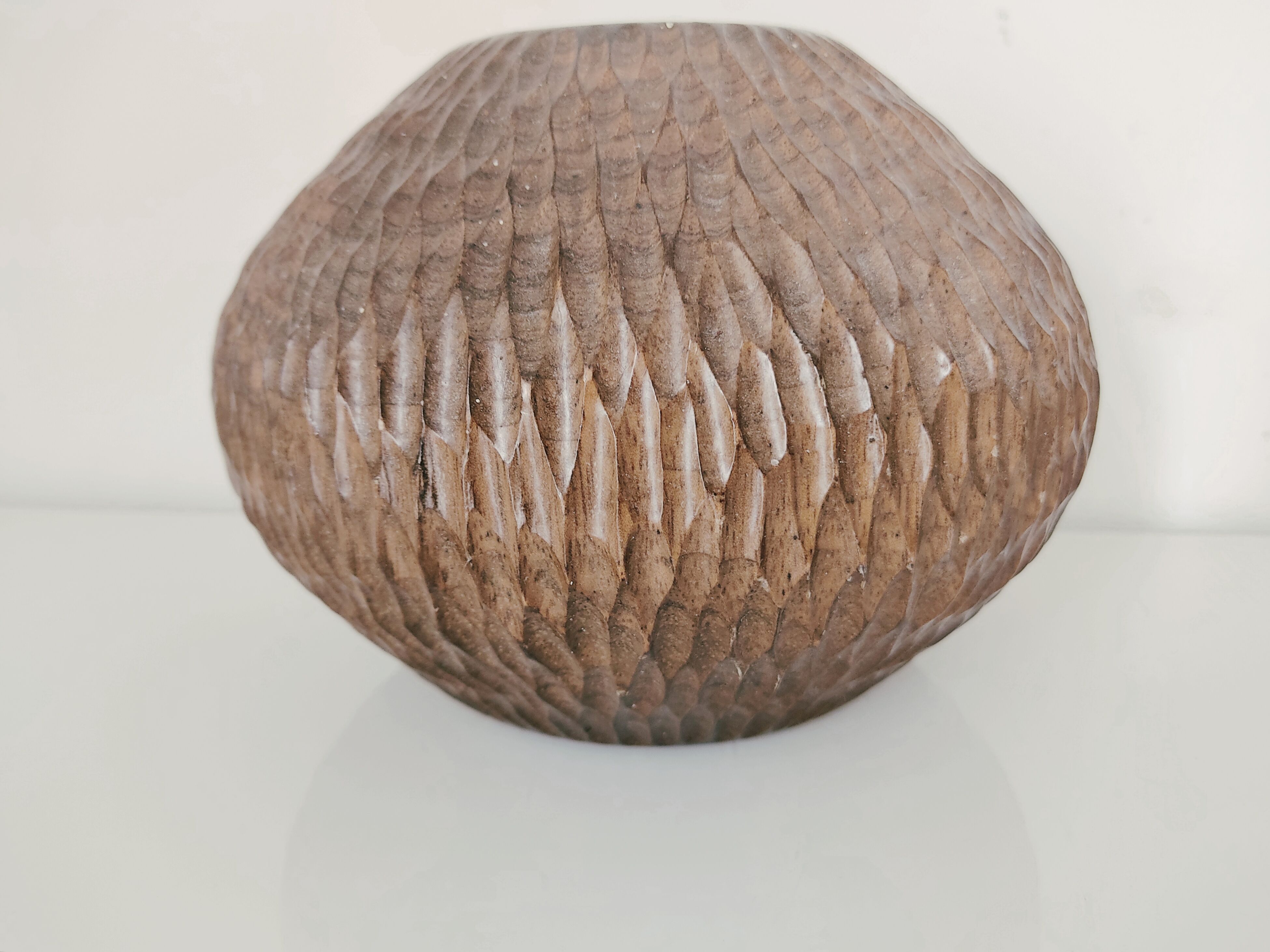 Carved wooden vase