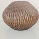 Carved wooden vase