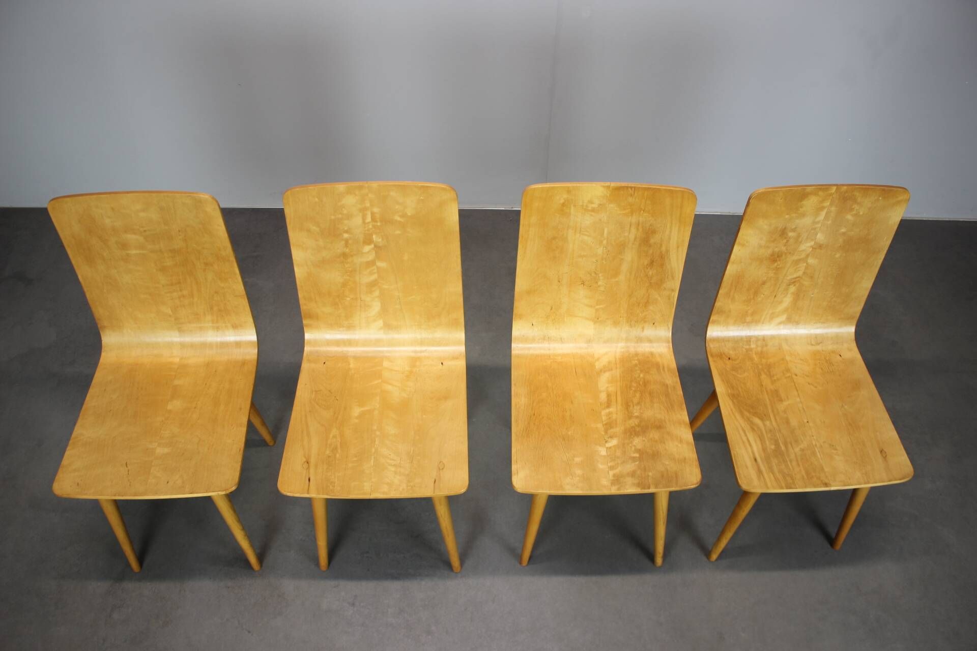Set of 4 vintage wooden dining chairs in mid-century modern style, Europe, 1970s.