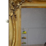 Miroir mural en bois doré du 19ème siècle