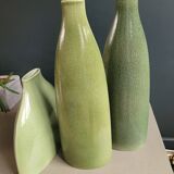 Trio of green enamelled vases