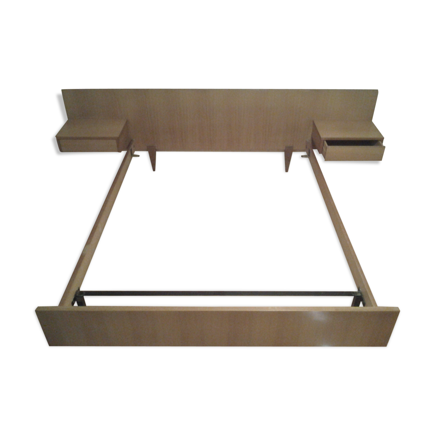 Bed with integrated bedside tables
