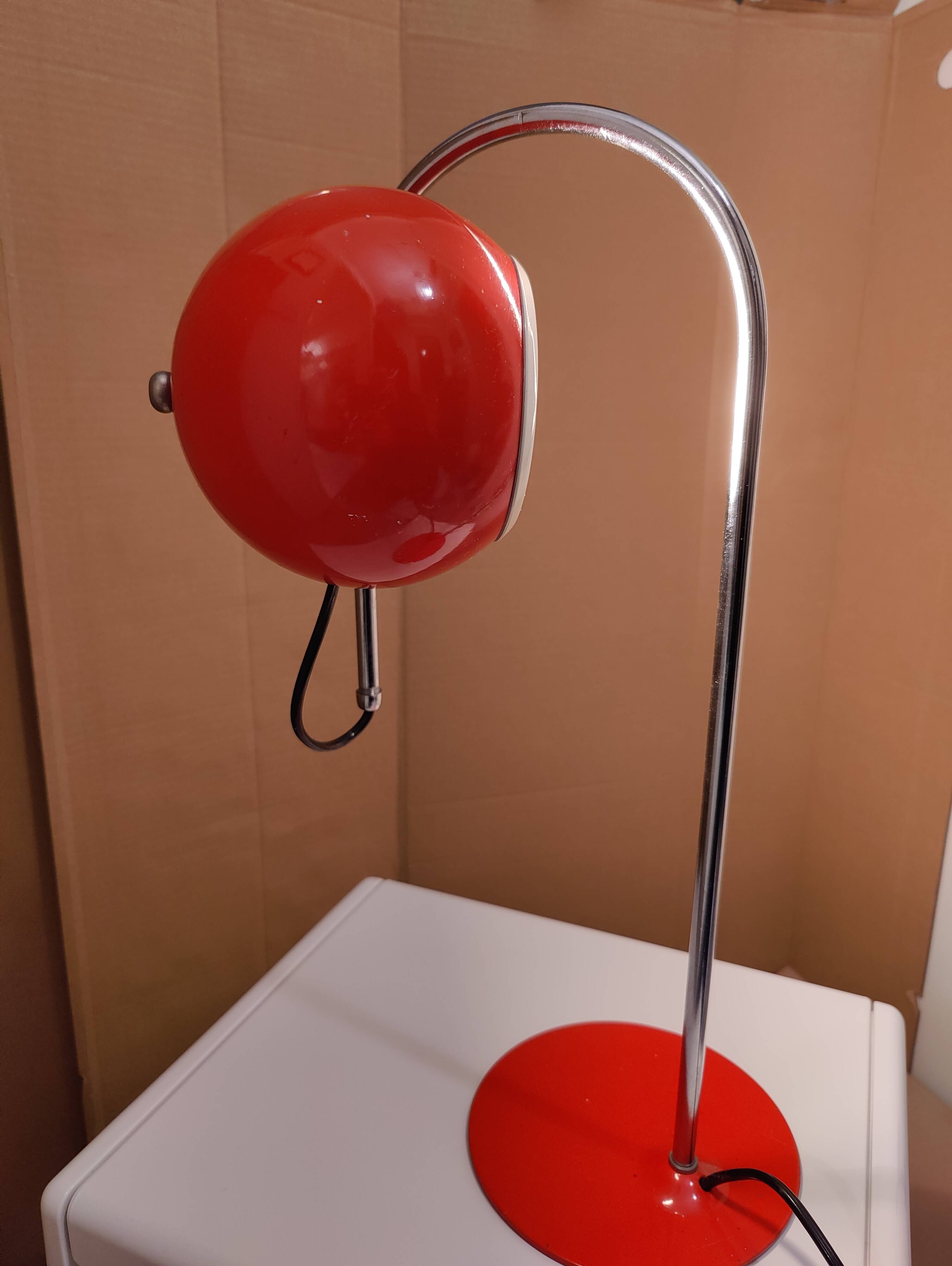 Eyeball space age orange desk or bedside lamp on an arc base